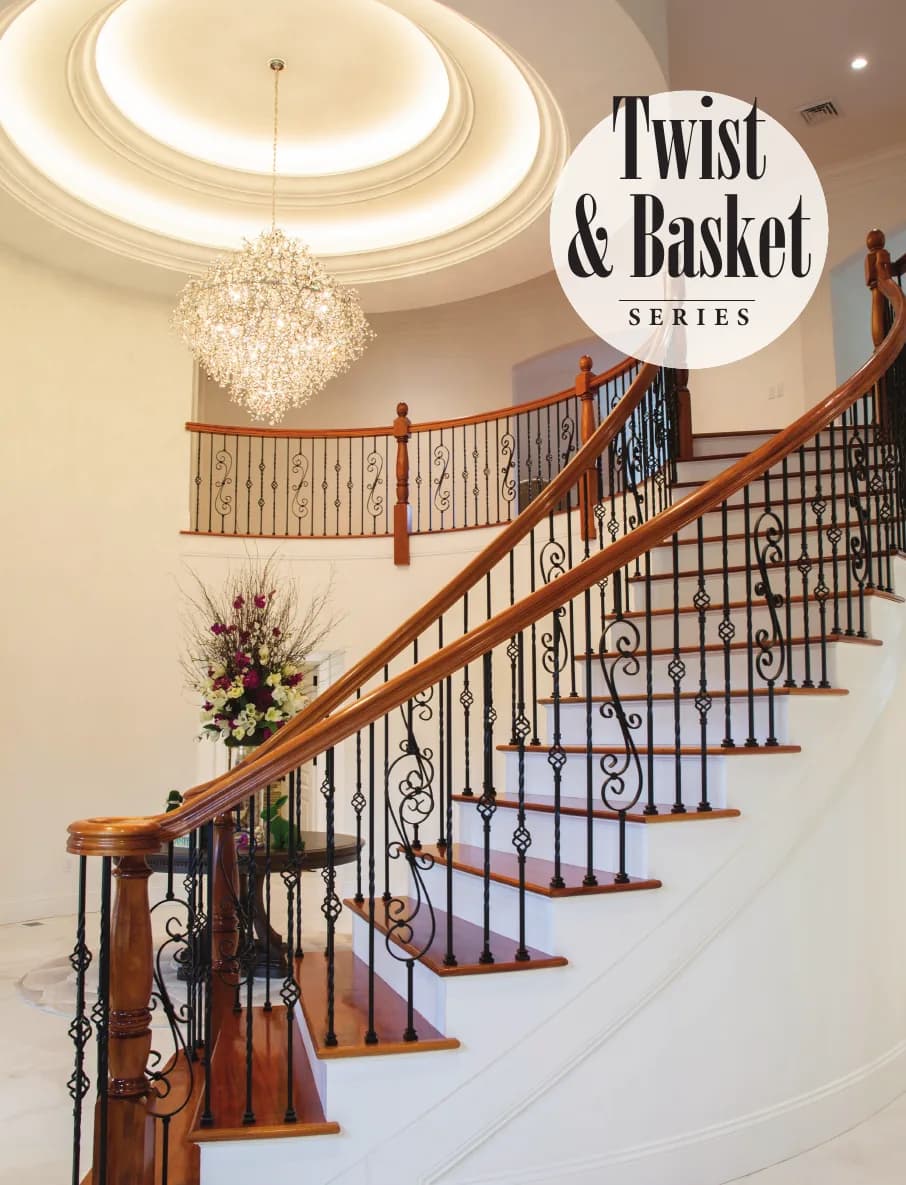Wrought-iron twist and basket balusters on a curved stair with a stained oak handrail