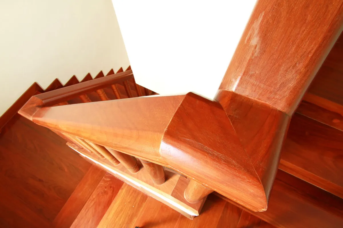 Hardwood volute and newel Snyder Stairs finished and installed